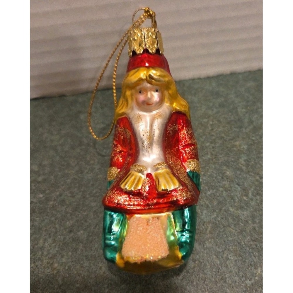 CHRISTMAS GLASS BLOWN GIRL IN SLED ORNAMENT